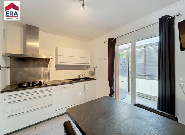 COUP DE COEUR pour cet appartement de 96,74M2 avec jardin , ascenseur proximité  Axium