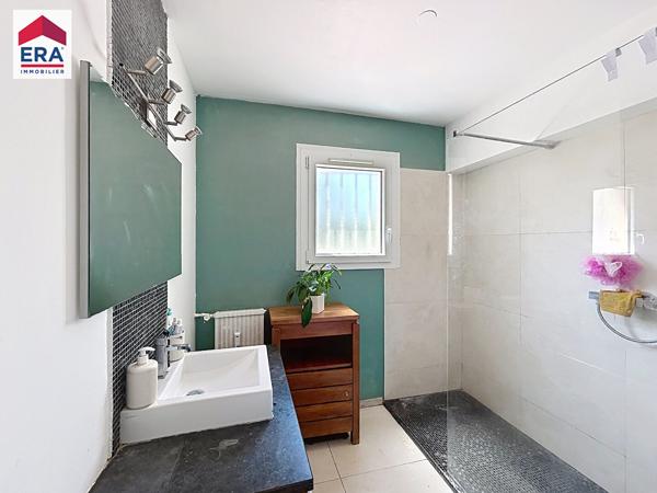 COUP DE COEUR pour cet appartement de 96,74M2 avec jardin , ascenseur proximité  Axium