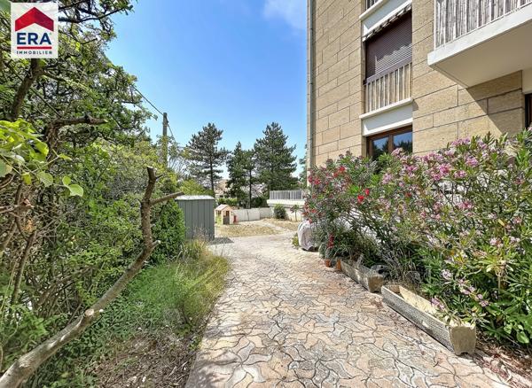 COUP DE COEUR pour cet appartement de 96,74M2 avec jardin , ascenseur proximité  Axium