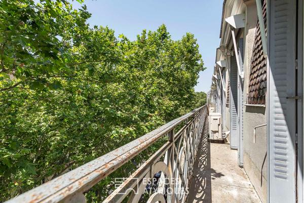 Appartement Haussmannien avec balcon en dernier étage