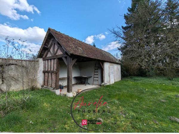 Longère  sur terrain arboré