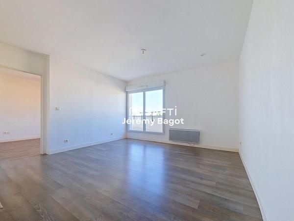 Un grand type 2 complet avec ascenseur parking et terrasse