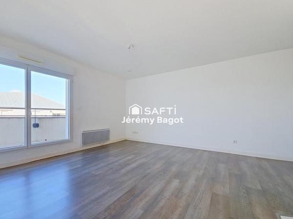 Un grand type 2 complet avec ascenseur parking et terrasse