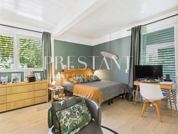 À la frontière de Biarritz, villa contemporaine sur le lac de Brindos avec des prestations haut de gamme, ANGLET