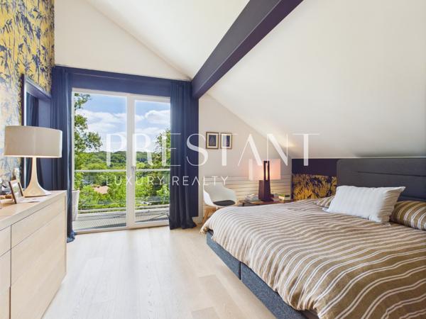À la frontière de Biarritz, villa contemporaine sur le lac de Brindos avec des prestations haut de gamme, ANGLET