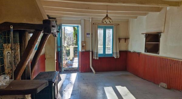 Maison individuelle sur terrain pentu de 1 hectare