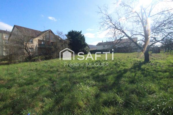 Terrain constructible à Devecey d'environ 1400 M² libre constructeur