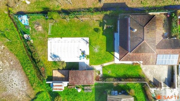 Maison familiale 5 chambres avec piscine, double garage et terrain de 1200 m² sans vis-à-vis