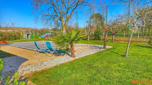 Maison familiale 5 chambres avec piscine, double garage et terrain de 1200 m² sans vis-à-vis