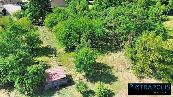 Terrain constructible 907 m² viabilisé plat