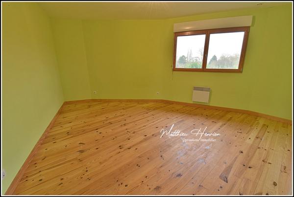 Maison d’architecte polygonale bioclimatique à ossature bois, unique sur le secteur