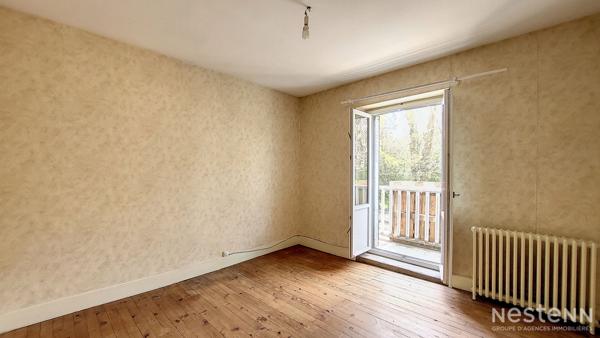 A Vendre Maison de 103 m² avec garages en sous-sol et jardin proche du chemin de Compostelle