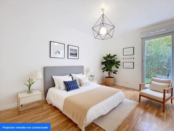 GRAND 2 PIECES AVEC TERRASSE JARDIN PARKING