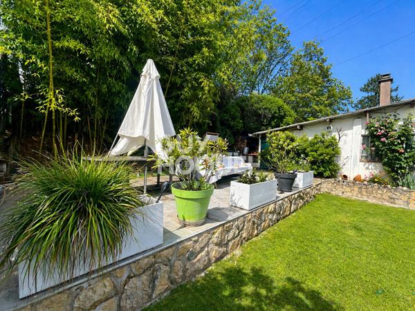 Appartement en rez de jardin avec exceptionnel jardin privatif à La Boisse