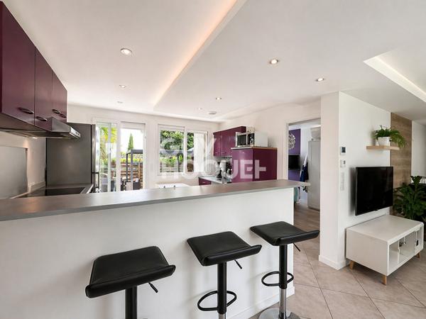 Appartement en rez de jardin avec exceptionnel jardin privatif à La Boisse