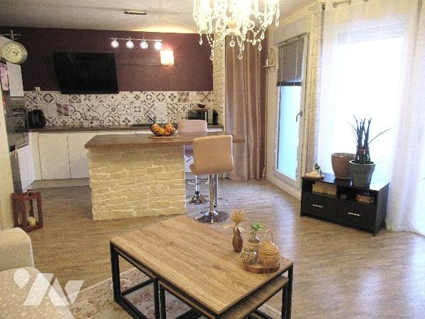 F3 de 59 m² avec balcon et parking en sous-sol