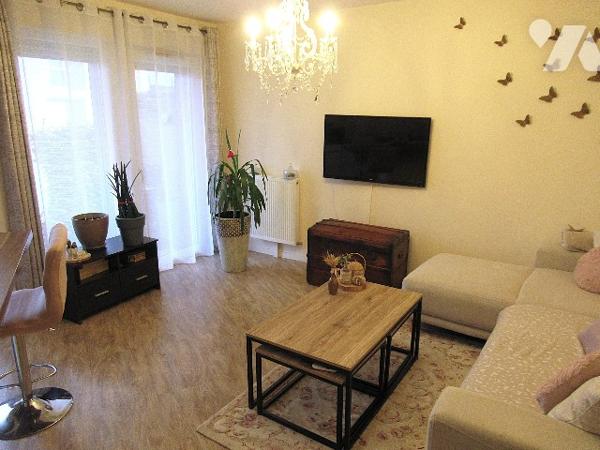 F3 de 59 m² avec balcon et parking en sous-sol
