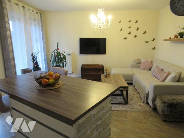 F3 de 59 m² avec balcon et parking en sous-sol
