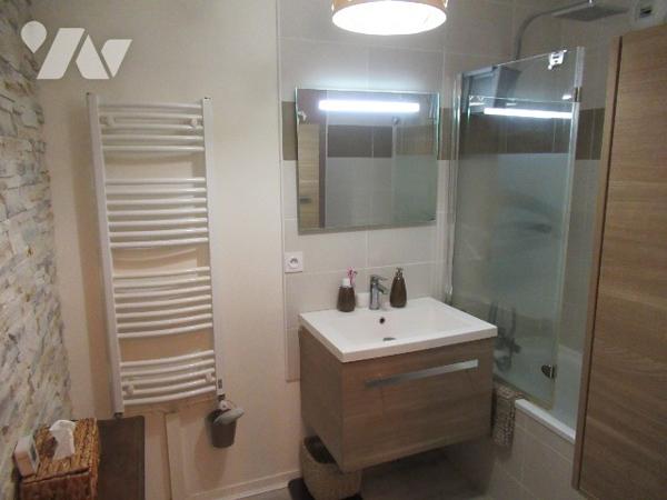 F3 de 59 m² avec balcon et parking en sous-sol