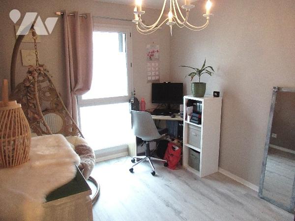 F3 de 59 m² avec balcon et parking en sous-sol