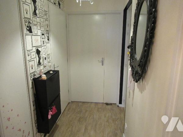 F3 de 59 m² avec balcon et parking en sous-sol