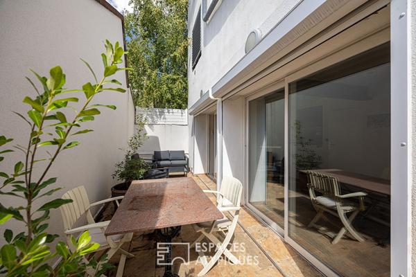 Loft dans une ancienne fabrique de poupées avec terrasse