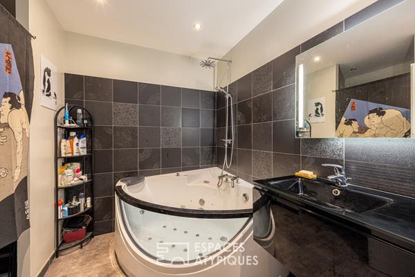 Loft dans une ancienne fabrique de poupées avec terrasse