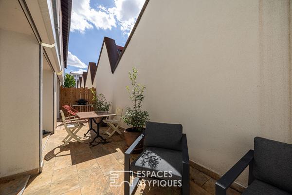 Loft dans une ancienne fabrique de poupées avec terrasse