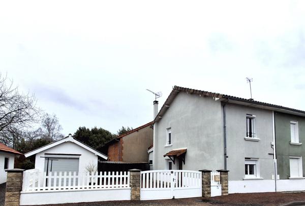 MAISON DE VILLE AVEC GARAGE ET COUR