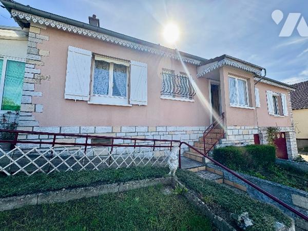 PAVILLON 5 PIECES AVEC DOUBLE GARAGE ET BEAU JARDIN