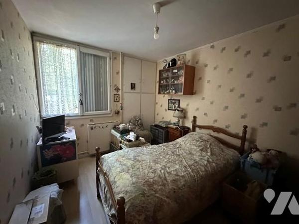 "INVESTISSEMENT" Appartement "loué", de type 3 pièces avec un box et un parking privatif 