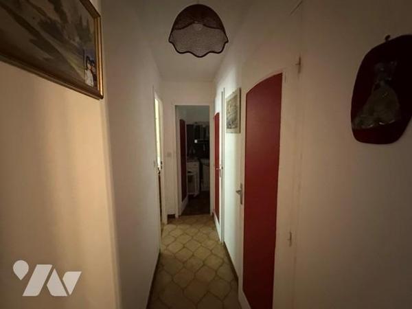 "INVESTISSEMENT" Appartement "loué", de type 3 pièces avec un box et un parking privatif 