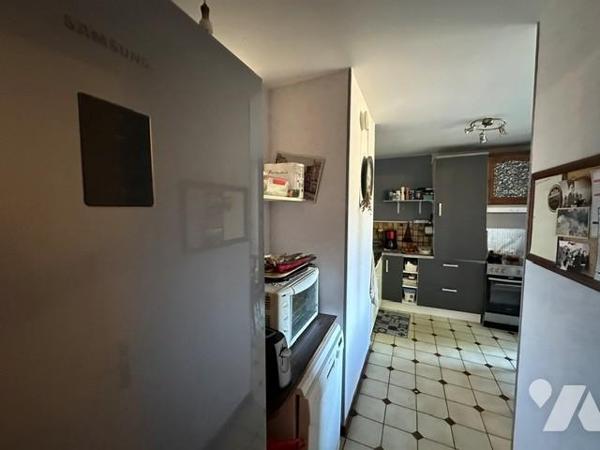 "INVESTISSEMENT" Appartement "loué", de type 3 pièces avec un box et un parking privatif 
