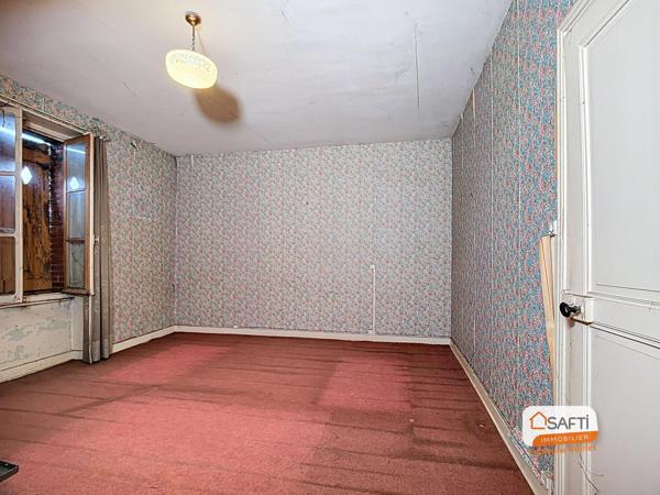 Maison de village à rénover - garage et jardinet