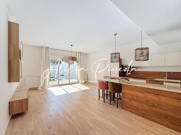 Appartement T3 avec jardin, dépendance et parkings