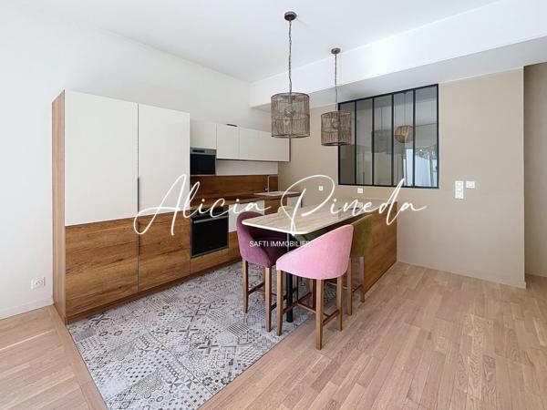 Appartement T3 avec jardin, dépendance et parkings