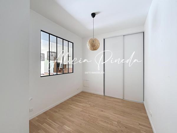 Appartement T3 avec jardin, dépendance et parkings