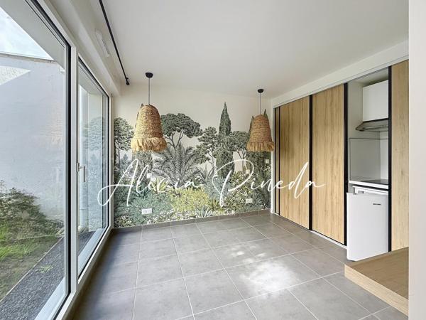 Appartement T3 avec jardin, dépendance et parkings