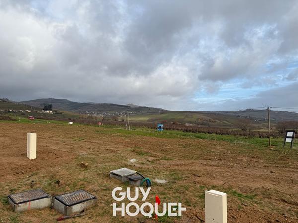 Terrain constructible 722m2 en lotissement - 69840 EMERINGES