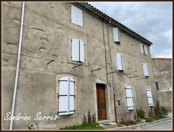A vendre ALZONNE maison 8 piéces sur 299 m² environ, grenier, garage et cour intérieure .