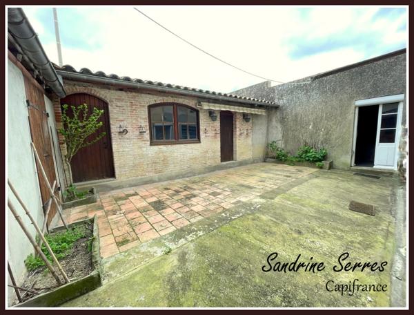 A vendre ALZONNE maison 8 piéces sur 299 m² environ, grenier, garage et cour intérieure .