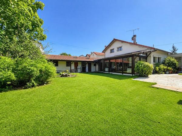 Maison 183m² 4 chambres sur grand terrain arboré