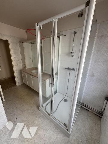 LISIEUX au rez-de-chaussée d'une rue et d'une résidence calmes Appartement 87m², 2 chambres + garage