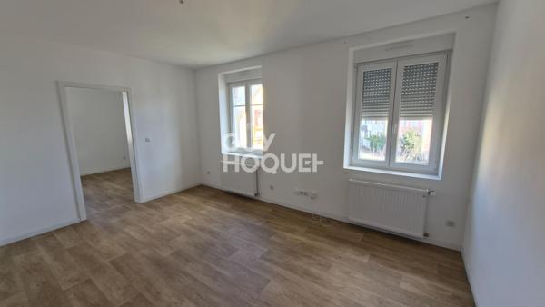 Immeuble de rapport  Mulhouse Dornach avec 3 F2 et 2 garages