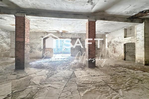 Un projet prêt à démarrer : créez la maison de vos rêves dans une bâtisse en pierre au cœur de Langlade.