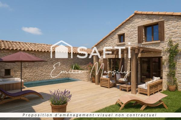 Un projet prêt à démarrer : créez la maison de vos rêves dans une bâtisse en pierre au cœur de Langlade.