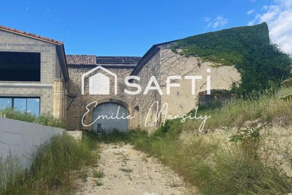 Un projet prêt à démarrer : créez la maison de vos rêves dans une bâtisse en pierre au cœur de Langlade.