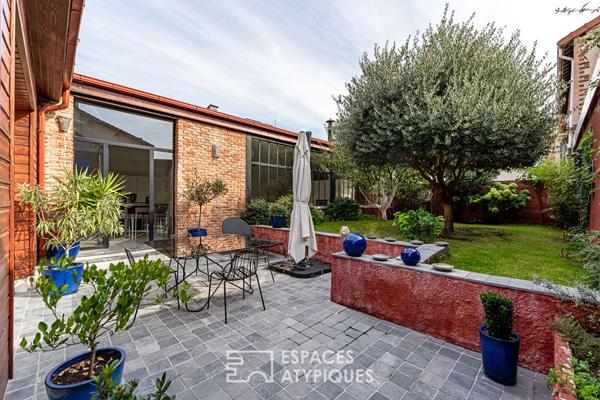 Ancien atelier transformé en loft avec Jardin