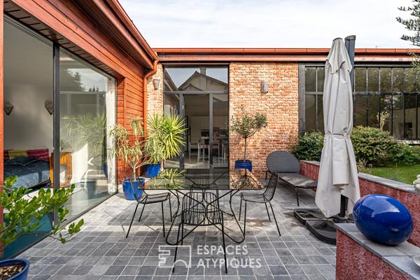 Ancien atelier transformé en loft avec Jardin