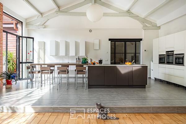 Ancien atelier transformé en loft avec Jardin